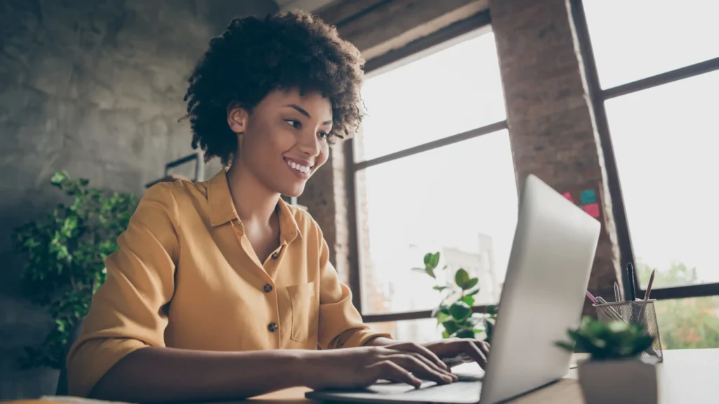 woman smiling laptop